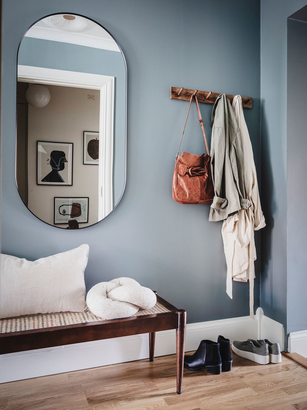 Hallway Mirror Reflecting Light and Style in Your Entryway