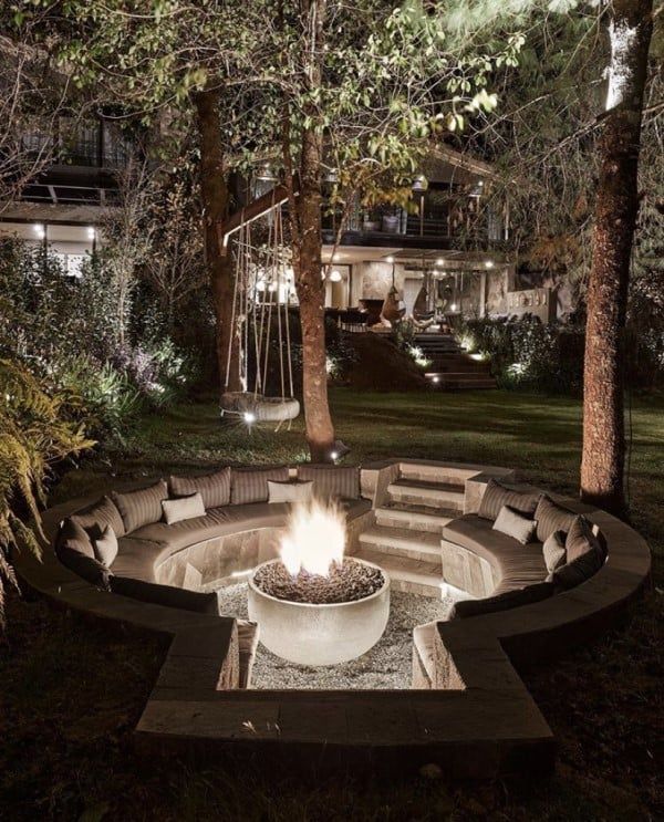 Fire Pit Garden Transform your outdoor space with a cozy gathering spot surrounded by flames and nature.